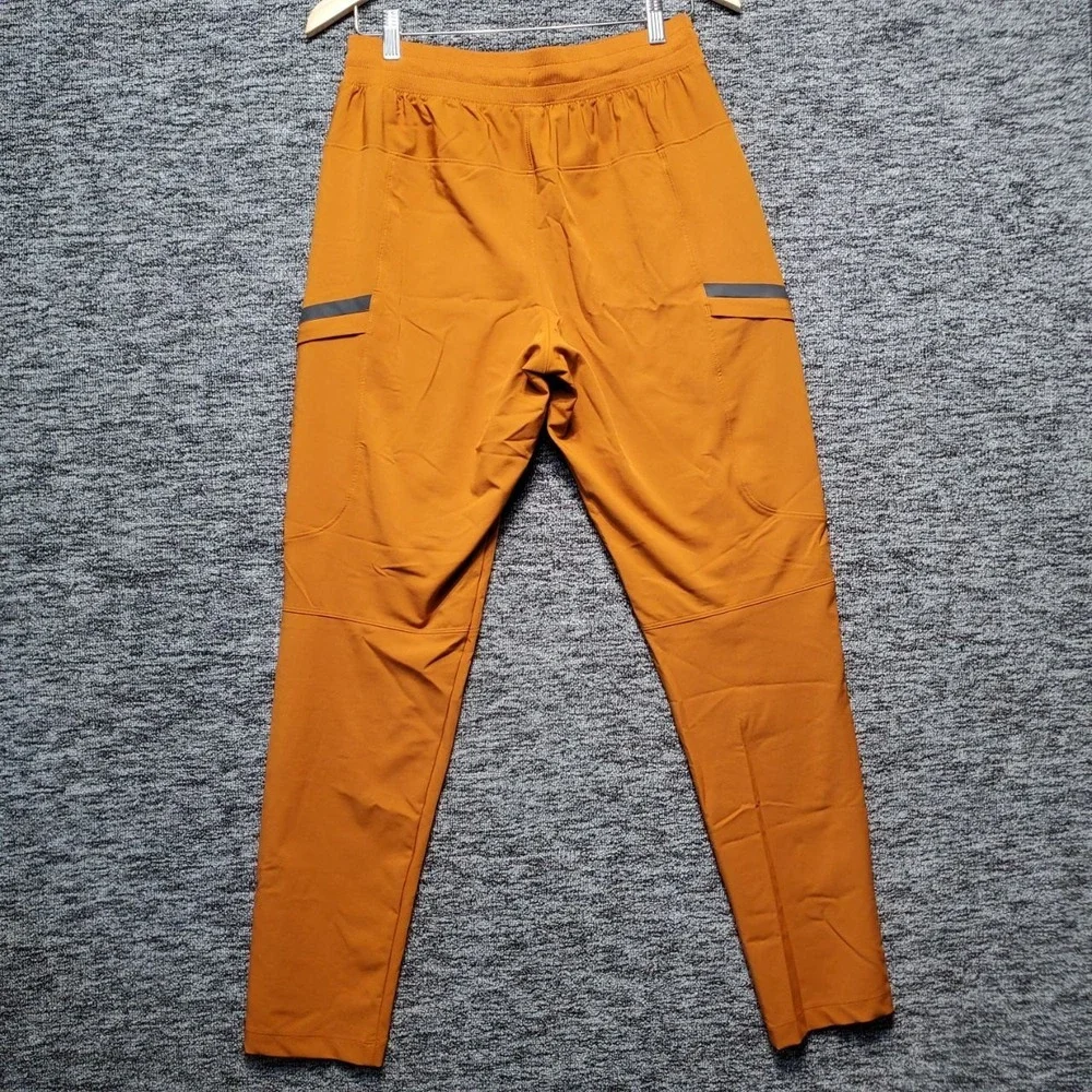 Under Armour 1373864 Hybrid Cargo Pants Mens Medium M Orange Joggers Athletic